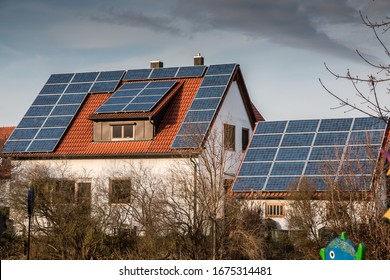 House with a lot of solar panels on the roof