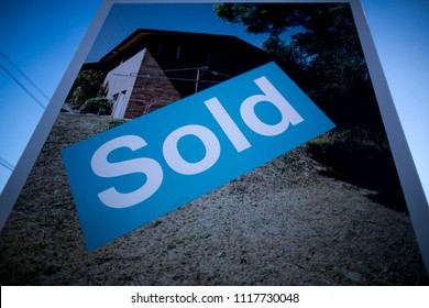 House Sold Sign Rectangle Written With Blue And In White In Sydney City Inner Suburb Australia 