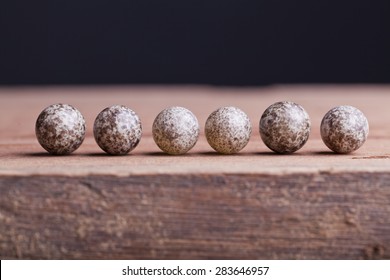 House Sparrow Egg Isolated On Wood Background