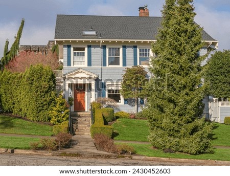 House in a suburb of Tacoma Washington state with surrounding nature. 
