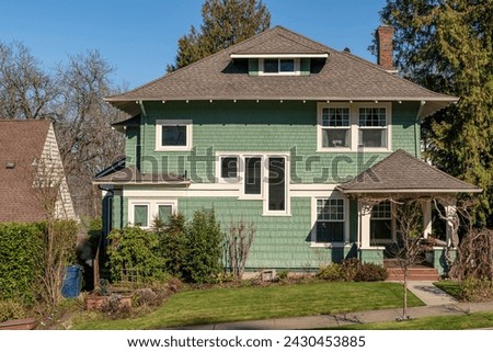 House in a suburb of Tacoma Washington state with surrounding nature.