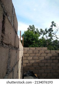 House Under Constuction With Plant Background