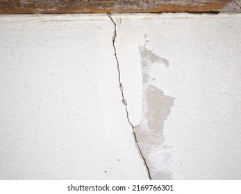 House Wall Crack Near Window Frame. Closeup Photo, Blurred.