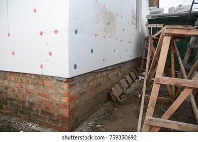 House Wall Renovation With External Rigid Styrofoam Board Insulation Outdoor For Energy Saving.