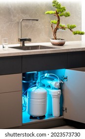 House Water Filtration System. Osmosis Deionization System. Installation Of Water Purification Filters Under Kitchen Sink