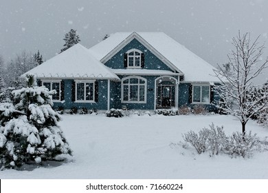 House In Winter Snow Storm