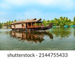 A houseboat sailing in Alappuzha backwaters in Kerala state in India