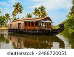 A houseboat sailing in Alappuzha backwaters in Kerala state in India