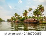 A houseboat sailing in Alappuzha backwaters in Kerala state in India