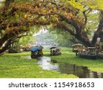 Houseboats on the backwaters of Kerala in Alappuzha (Alleppey).