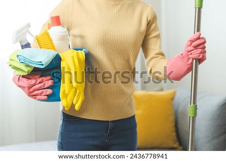 Household clean up, asian woman worker holding bucket and mop when cleaning is done at home. Maid, housekeeper cleaner organizing messy dirty and untidy to tidy, housekeeping housework or chores.
