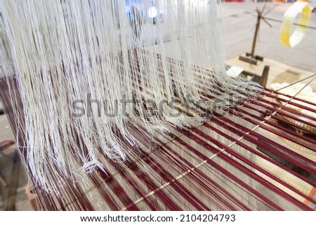 Household Loom weaving - Detail of weaving loom for homemade silk or textile production of Thailand  Photo stock © 