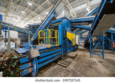 Household waste sorting and recycling plant. Press for pressing plastic bottles. - Powered by Shutterstock