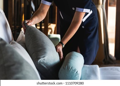 Housekeeper cleaning a hotel room - Shutterstock ID 1110709280