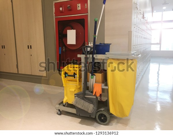 Housekeeping or Cleaning\
Cart with yellow\
bag