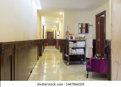 Housekeeping Maid Cart In Hotel Corridor