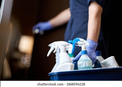 Housemaid Opening The Door To The Room For Cleaning