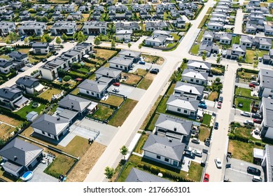 Houses aerial birds eye view. Aerial view of a typical suburb in Poland. Modern architecture and design. 