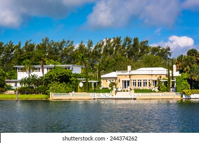 Houses Along Collins Canal In Miami Beach, Florida.