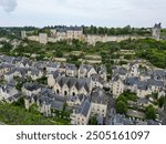 Houses and the hill with the medieval castle in the town of Chinon, department of Indre-et-Loire, France