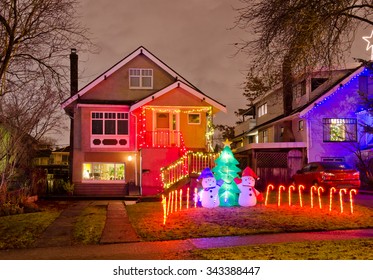 Houses, Neighborhood Decorated And Lighted For Christmas And For New Year Eve . Night In Vancouver, Canada.