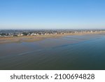 The houses on the edge of Sword beach in Hermanville-sur-Mer in Europe, in France, in Normandy, towards Ouistreham, in Arromanches, in spring, on a sunny day.