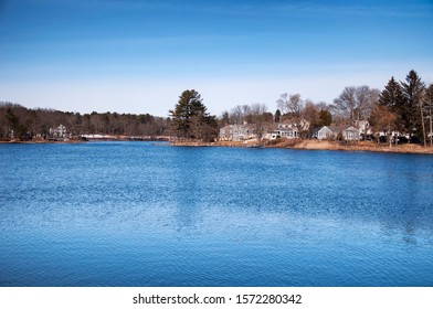 Houses On The Kennebunk River In Kennebunkport Maine On A Clear Blue Sky Winter Day.