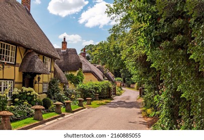 Houses on the street in an English village. British village scene. Village in England. Countryside english village