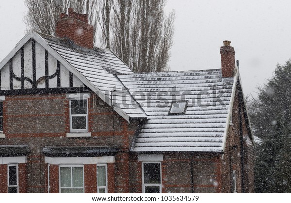 Houses with snow fall british\
