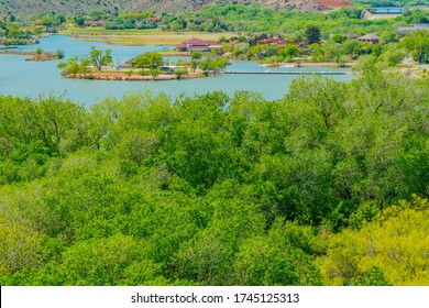 Houses Surround And Line Lake Ransom Canyon And Make A Beautiful Residential Area. This Is Just Outside LubbockTexas In Lubbock County.