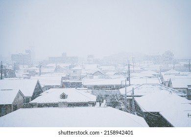 The Houses Of Tokyo Covered In Snow On A Cold Winter Day