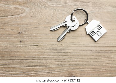 House-shaped key in the wood