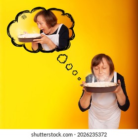 A Housewife With Homemade Cakes On A Colored Background Is Thinking About A Piece Of Pie. Joyful Half-living
Mature Woman Enjoying Birthday Party Eating Apple Pie. Senior Woman Posing With Dessert. 