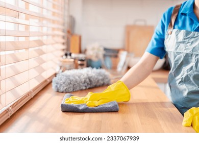 Housework or house keeping service female cleaning dust in house, cleaning agency small business. professional equipment cleaning old home.