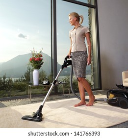 Housework, vacuum cleaner, young couple, home, kitchen. Housework
