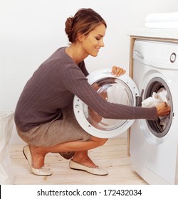 Housework, Young Woman Doing Laundry