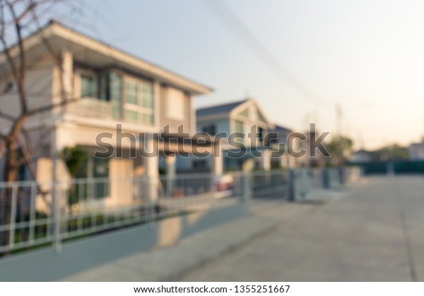 Housing subdivision or housing development blur\
background. Also call tract housing consist of house in large tract\
of land that divided into smaller. Business process by developer\
and builder.