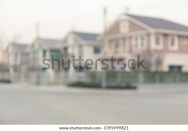 Housing subdivision or housing development blur\
background. Also call tract housing consist of house in large tract\
of land that divided into smaller. Business process by developer\
and builder.