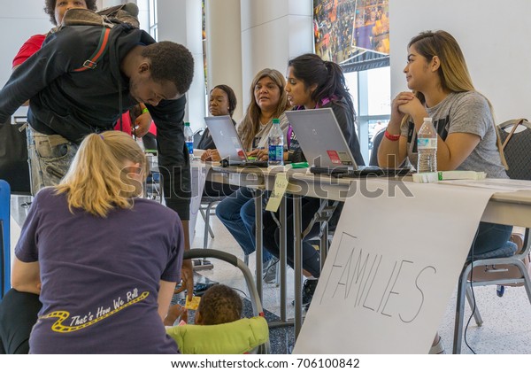 Houston, Texas, August 30, 2017:\
Another shelter opens at NRG Center as refugees seek safety in\
Houston.Trained support workers check in new flood\
evacuees