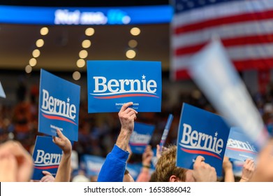 Houston, Texas - February 23, 2020: Supporters holds signs BERNIE as Democratic Presidential candidate Bernie Sanders speaks to the crowd during his rally campaign ahead of the primary elections