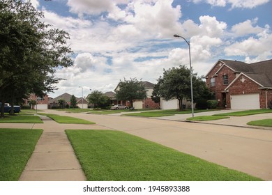 Houston, Texas – June 20, 2016: American Suburbs. Random Street In The Neighborhood On A Cloudy Day.