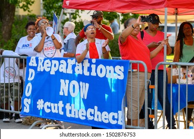 Houston, Texas - September 12, 2019: Small, vocal group of ADOS activists demand reparations for slavery outside Democratic primary debate venue near Texas Southern University campus