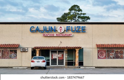 Houston, Texas USA 10-14-2020: Cajun Fuze Seafood Restaurant Building Exterior In Houston TX, Fusion Cuisine. An Empty Parking Lot Is In Foreground.