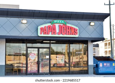 Houston, Texas USA 10-27-2022: Papa John's Pizza Storefront Exterior In Houston, TX. Popular American Fast Food Restaurant Chain Founded In 1984.