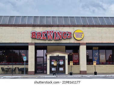 Houston, Texas USA 12-03-2021: BreWingZ Sports Bar And Grill Storefront Exterior In Houston, TX. Local Fast Food Restaurant Chain.