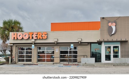 Houston, Texas USA 12-03-2021: Hooters Restaurant And Bar Exterior In Houston, TX. Food Service Business Chain Founded In 1983.