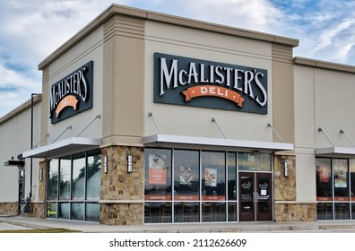 Houston, Texas USA 12-03-2021: McAlister's Deli storefront in Houston, TX. Fast casual American restaurant chain founded in 1989.