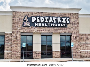 Houston, Texas USA 12-05-2021: Pediatric Healthcare Building Exterior In Houston, TX. Comprehensive Wellness Practice For Children And Teens.