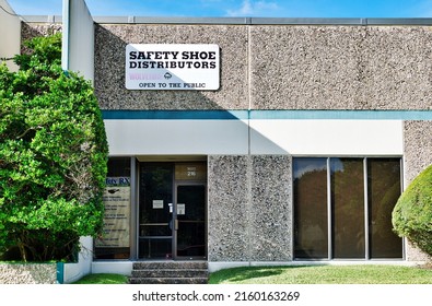 Houston, Texas USA 12-05-2021: Safety Shoe Distributors Office Building Exterior In Houston TX. Wholesaler Of Heavy Duty Footwear.