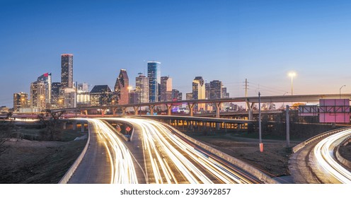 Houston, Texas, USA downtown skyline over the highways at dusk. - Powered by Shutterstock